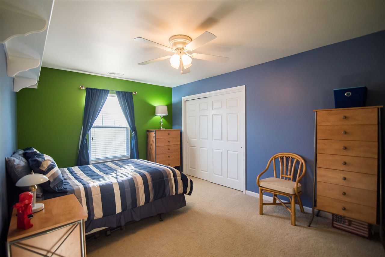 2307 Bright Future Way Raleigh, NC 27614 - Photo 18 of 23 Bedroom featuring plush carpet, single window and large double door closet. Bedroom