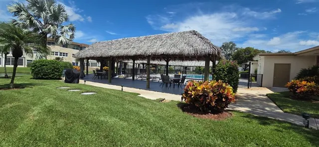 a house view with a garden space