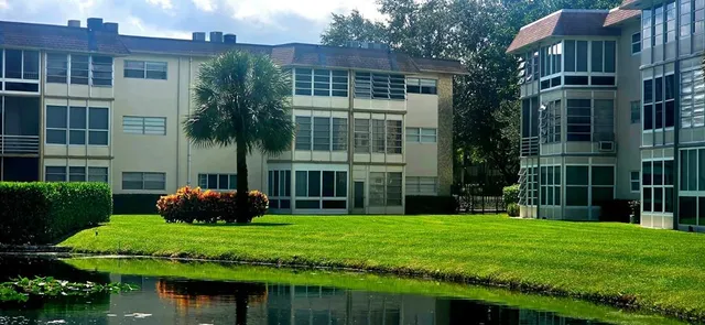a view of a lake with a building in the background