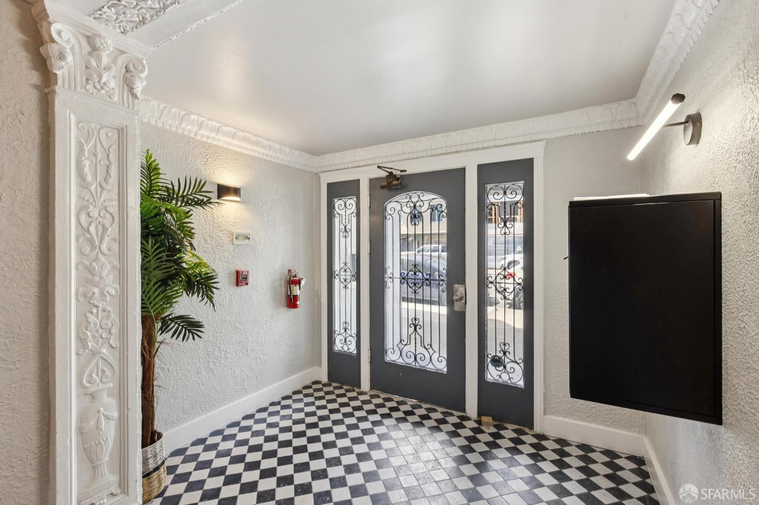 880 26th Avenue, Unit 3 San Francisco, CA 94121 - Photo 11 of 13 a bedroom with a balcony and furniture