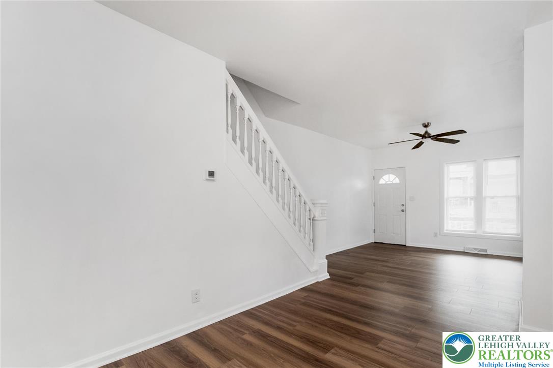 909 South Hall Street Allentown, PA 18103 - Photo 15 of 36 a view of empty room with wooden floor and fan