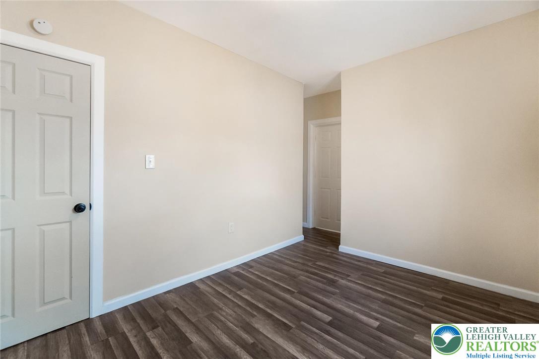 909 South Hall Street Allentown, PA 18103 - Photo 27 of 36 a view of an empty room with wooden floor