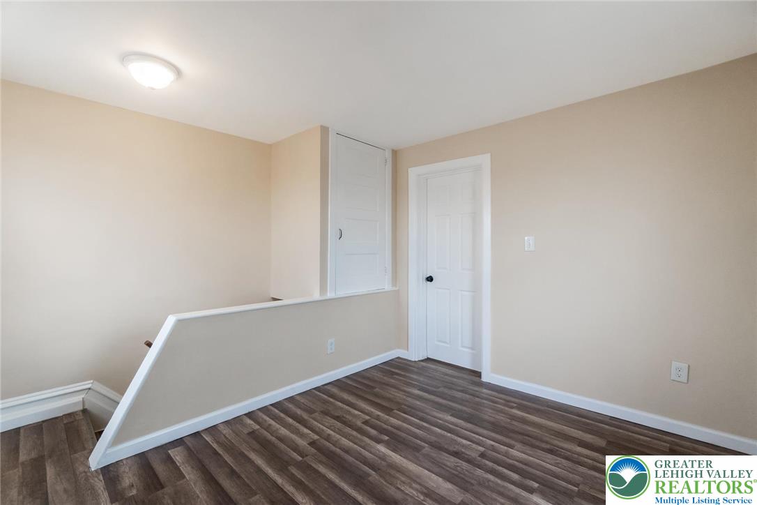 909 South Hall Street Allentown, PA 18103 - Photo 35 of 36 a view of an empty room with wooden floor