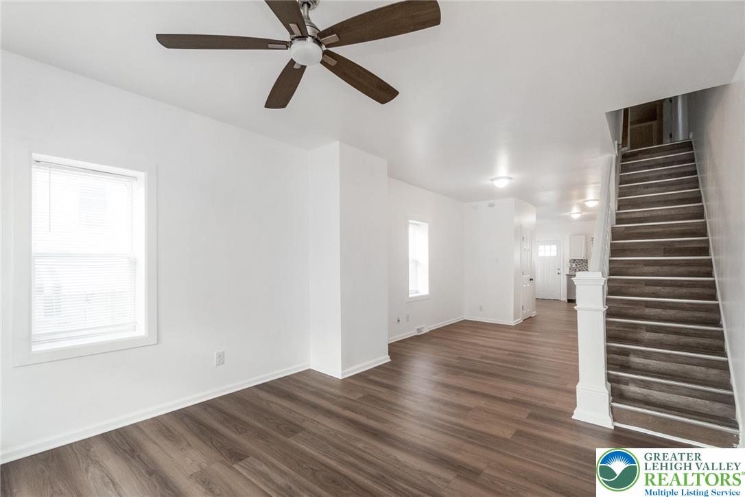 909 South Hall Street Allentown, PA 18103 - Photo 7 of 36 wooden floor in an empty room with a window
