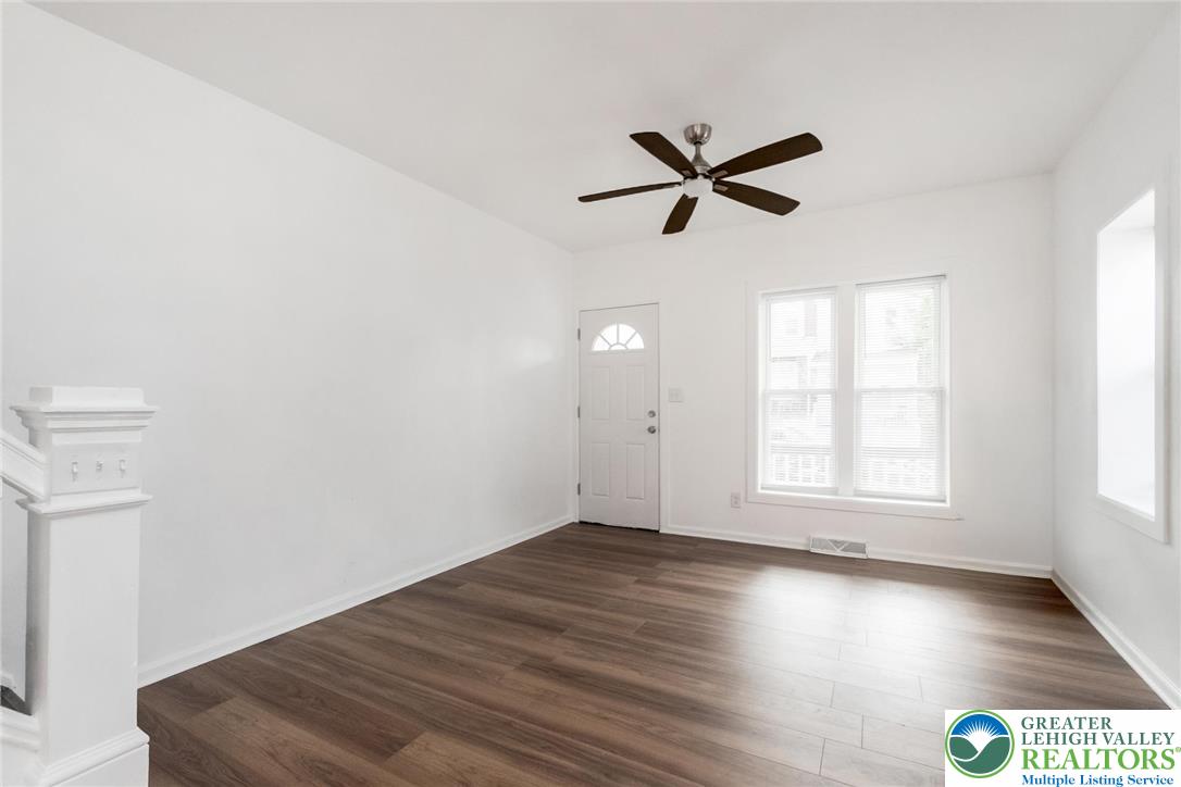 909 South Hall Street Allentown, PA 18103 - Photo 8 of 36 a view of empty room with wooden floor and fan