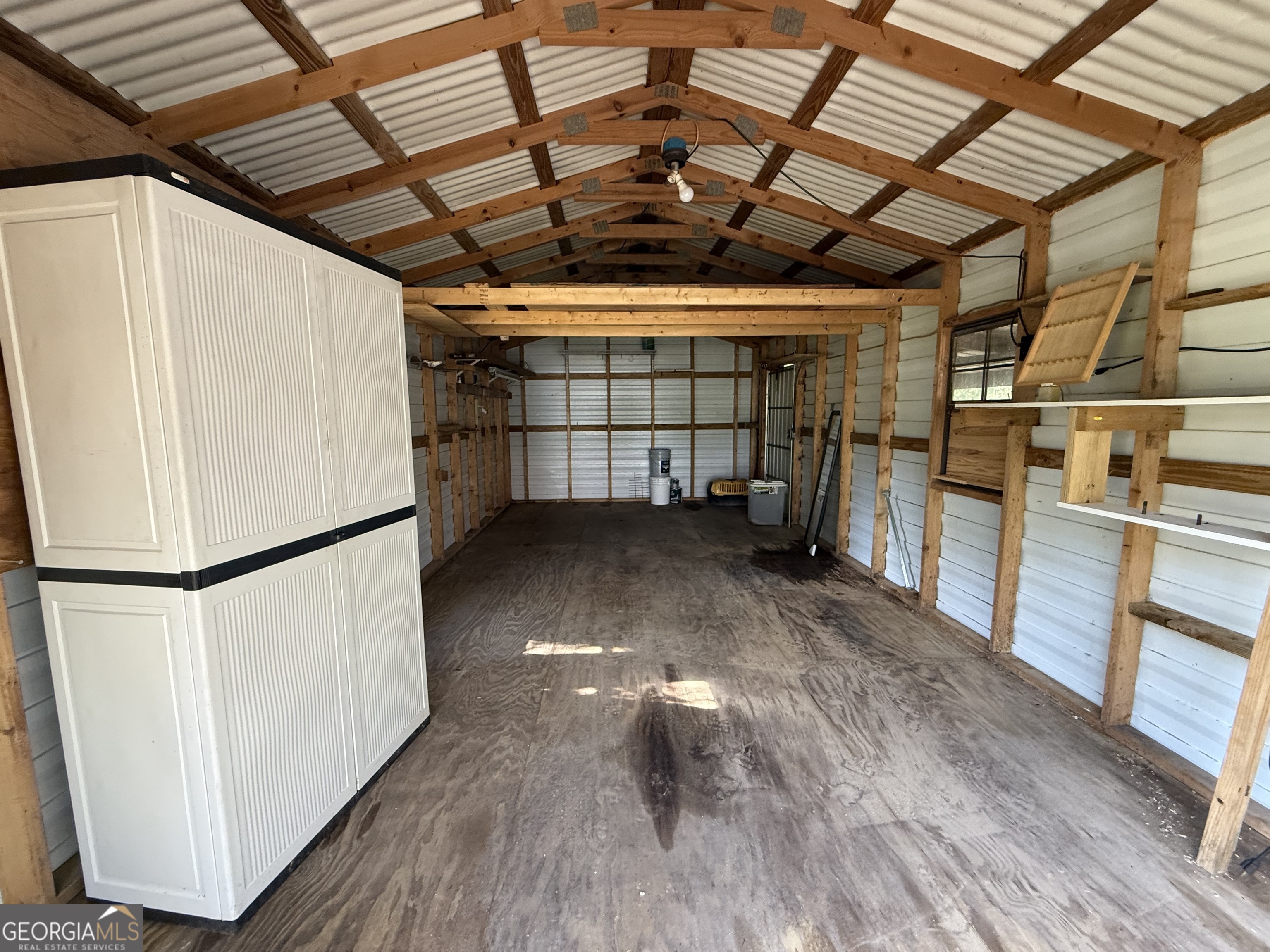 179 Creek Ridge Road Claxton, GA 30417 - Photo 18 of 19 a view of a refrigerator in a kitchen