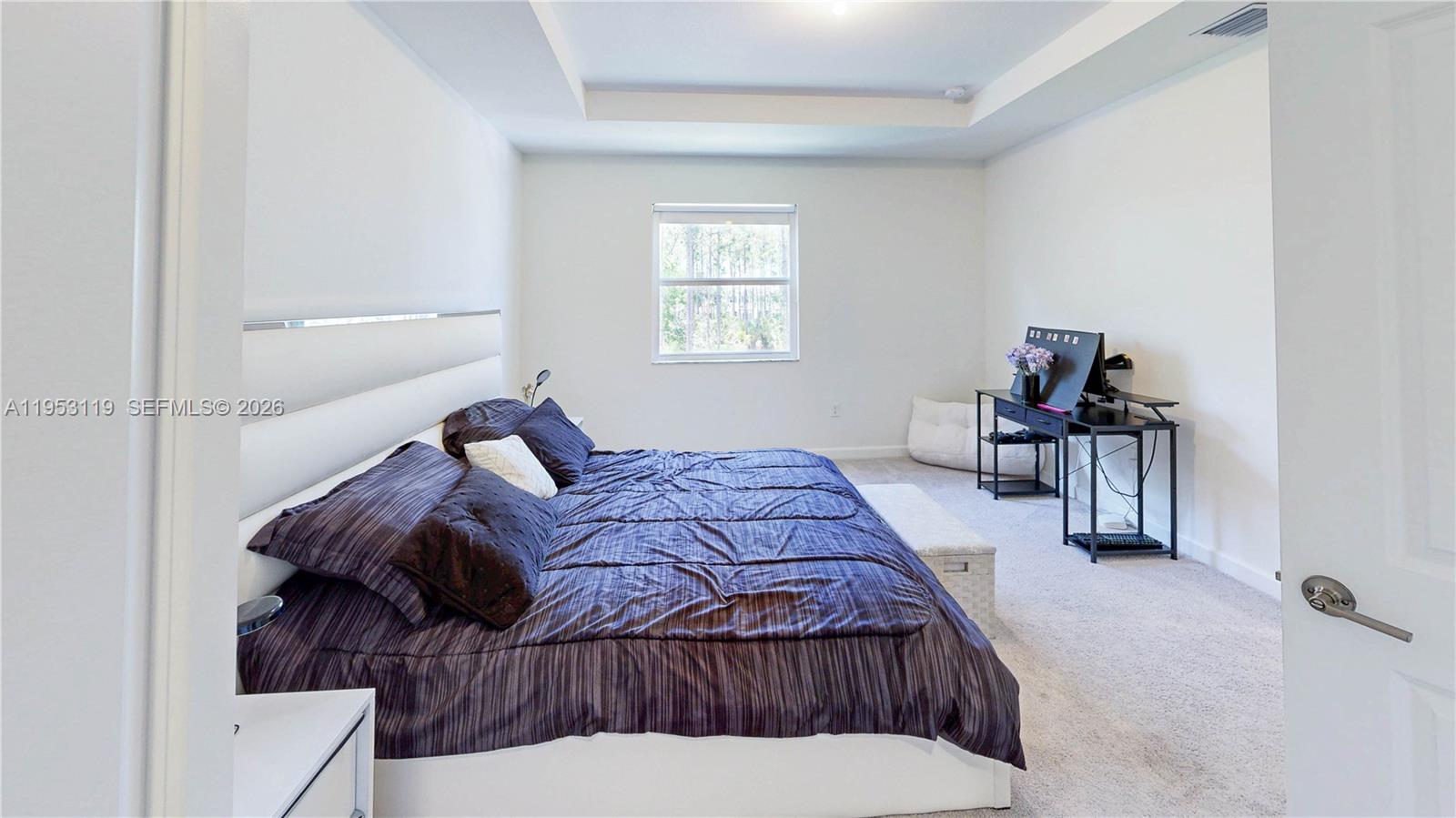 16233 Southwest 290th Terrace Homestead, FL 33033 - Photo 19 of 43 a bedroom with a large bed and furniture