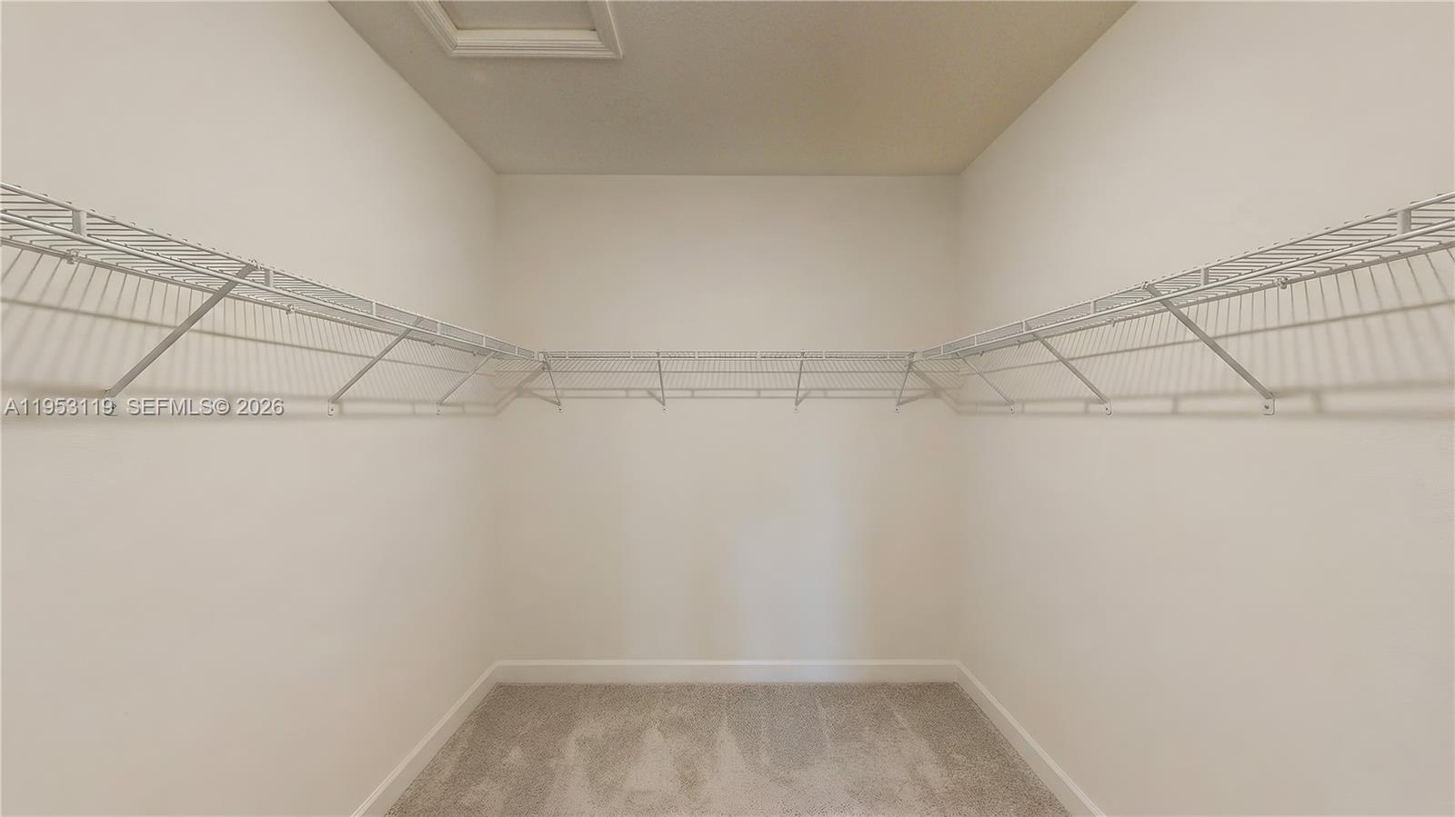 16233 Southwest 290th Terrace Homestead, FL 33033 - Photo 20 of 43 a view of a room with racks on the wall