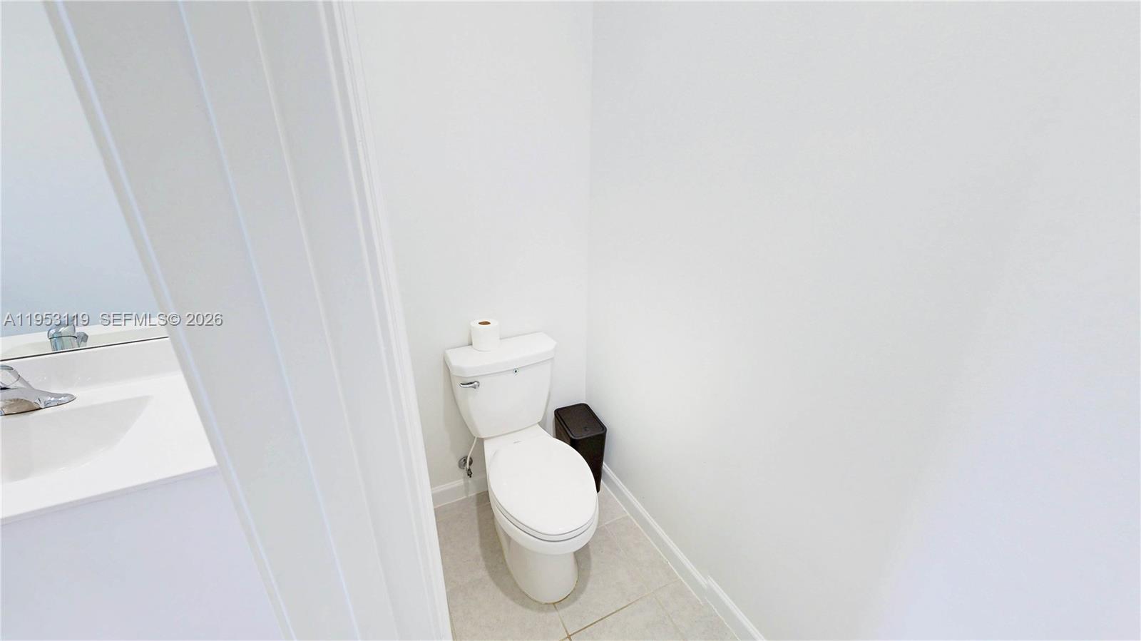 16233 Southwest 290th Terrace Homestead, FL 33033 - Photo 23 of 43 a white toilet sitting next to a white sink