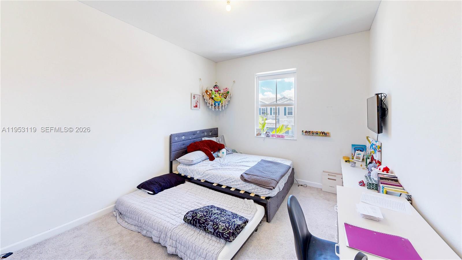 16233 Southwest 290th Terrace Homestead, FL 33033 - Photo 27 of 43 a living room with furniture and a window