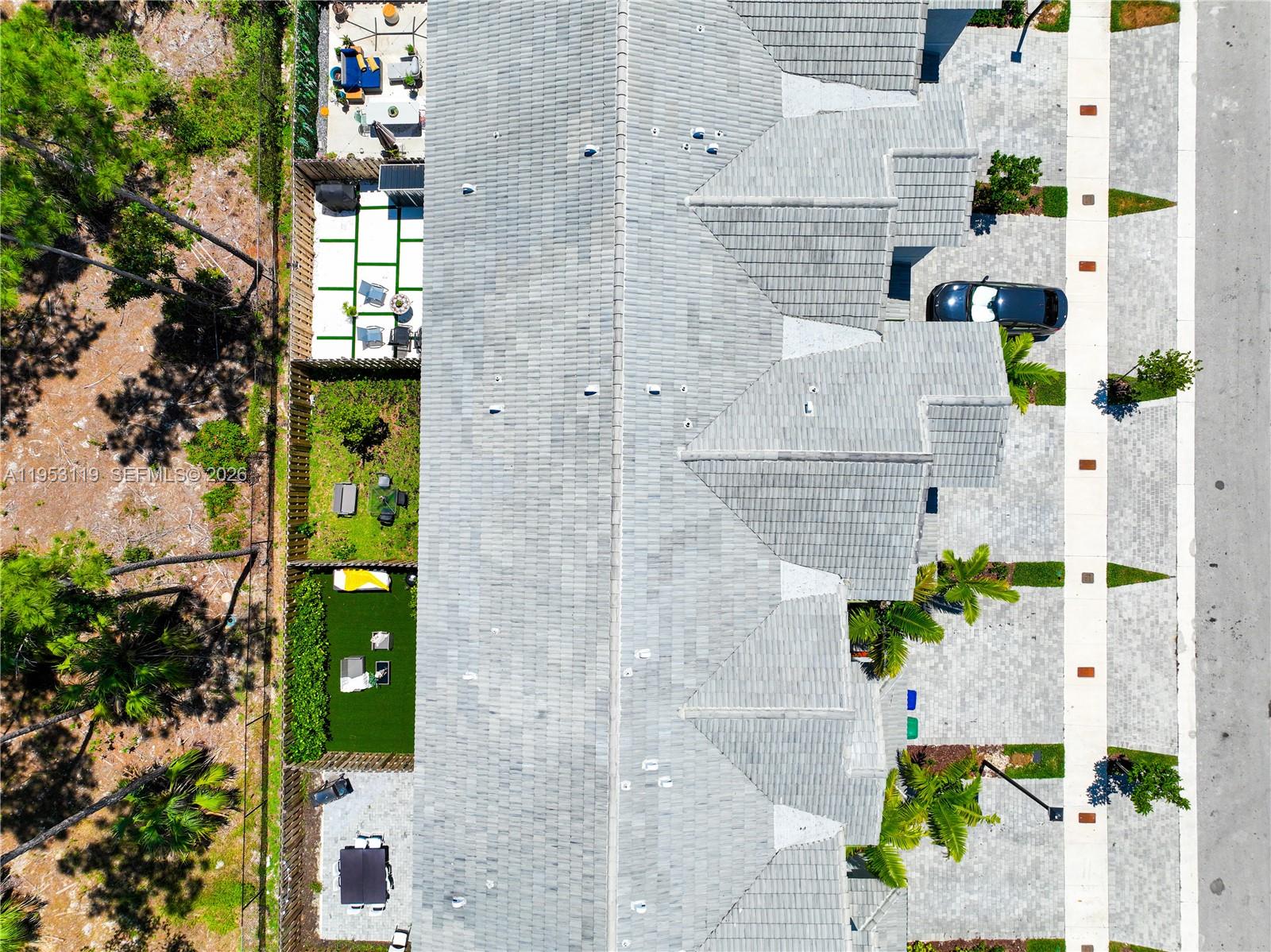 16233 Southwest 290th Terrace Homestead, FL 33033 - Photo 37 of 43 a aerial view of a house with a garden