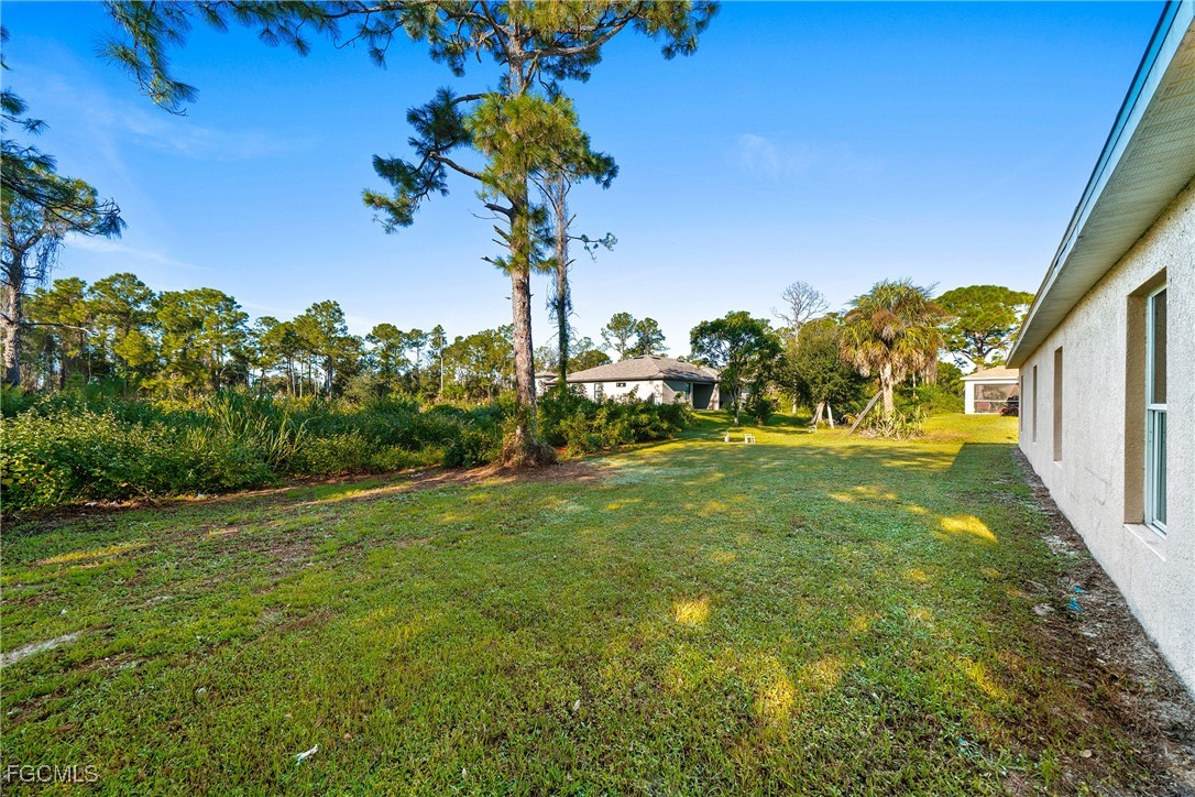 4733-4735 30th Street Southwest Lehigh Acres, FL 33973 - Photo 33 of 43 a view of a garden