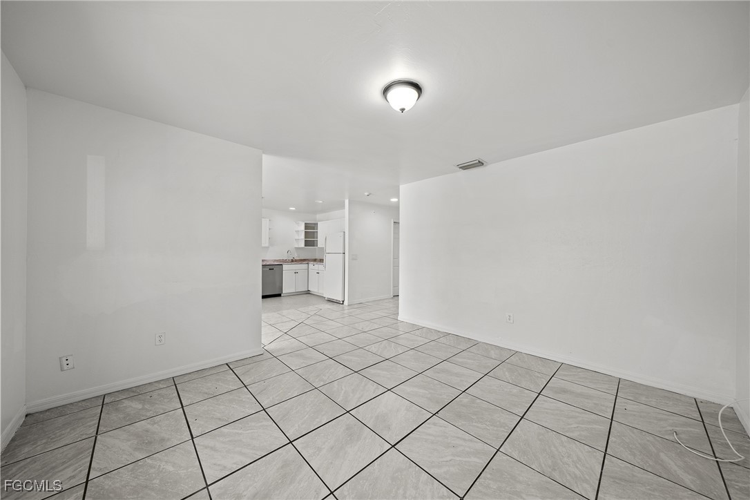 4733-4735 30th Street Southwest Lehigh Acres, FL 33973 - Photo 6 of 43 a view of an empty room