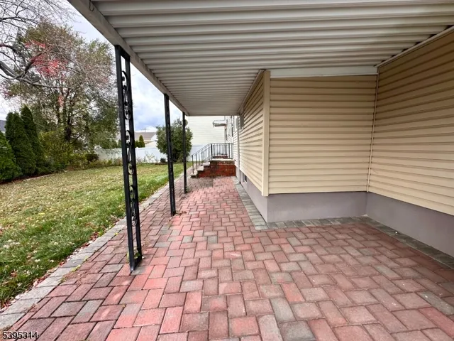a view of a porch with a bench