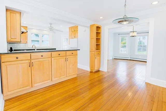 a bathroom with a sink a mirror and a shower