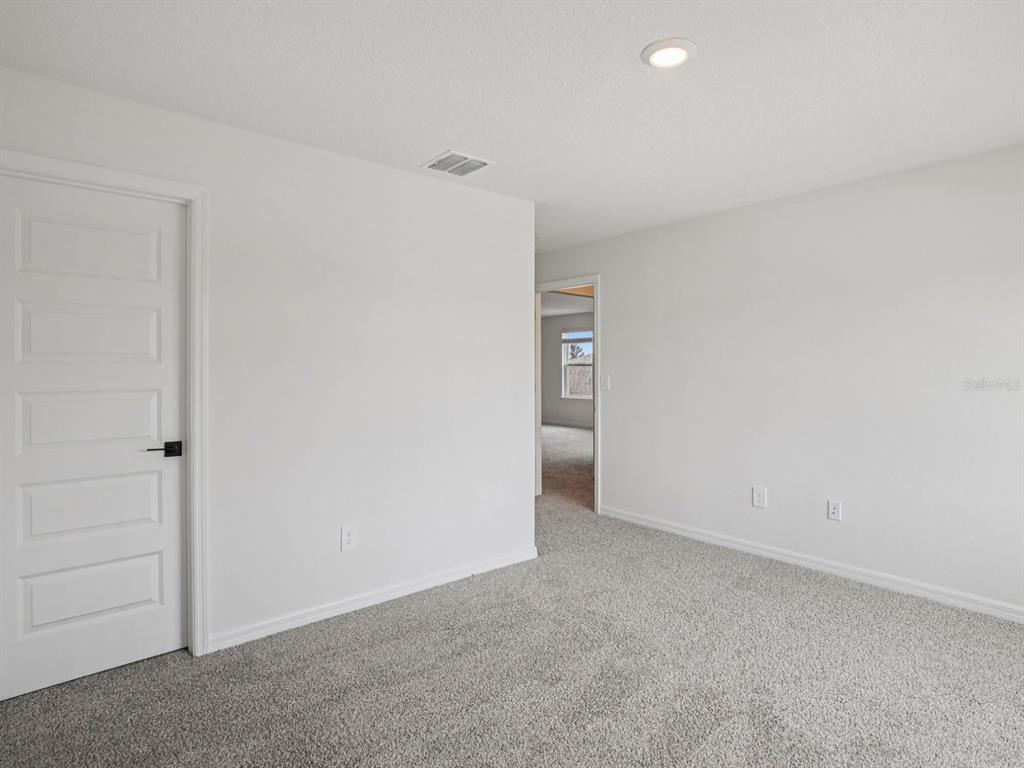 10821 Heirloom Farms Run Parrish, FL 34221 - Photo 11 of 13 a view of an empty room