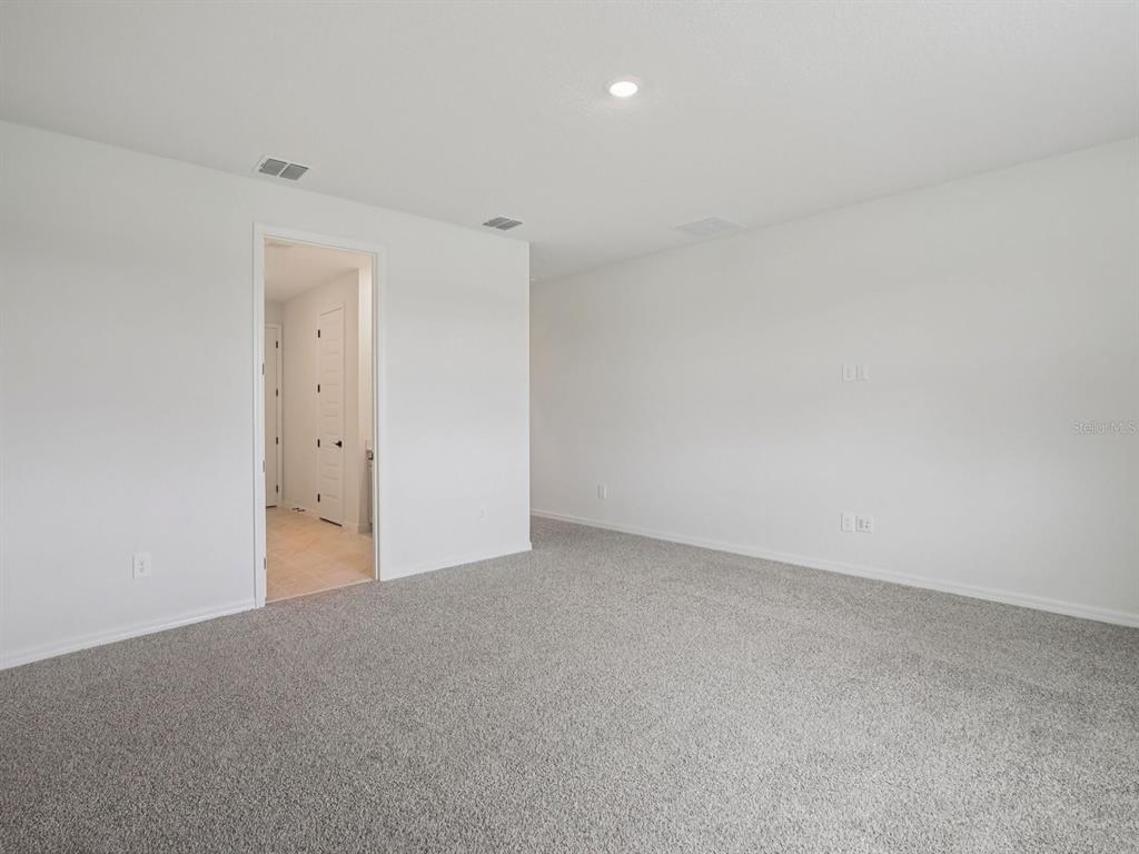 10821 Heirloom Farms Run Parrish, FL 34221 - Photo 7 of 13 a view of an empty room