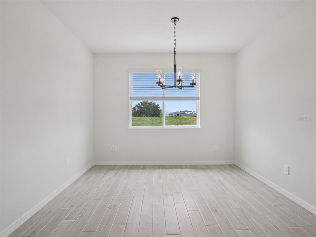 10821 Heirloom Farms Run Parrish, FL 34221 - Photo 9 of 13 a view of an empty room and window