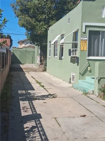 a view of a house with a street