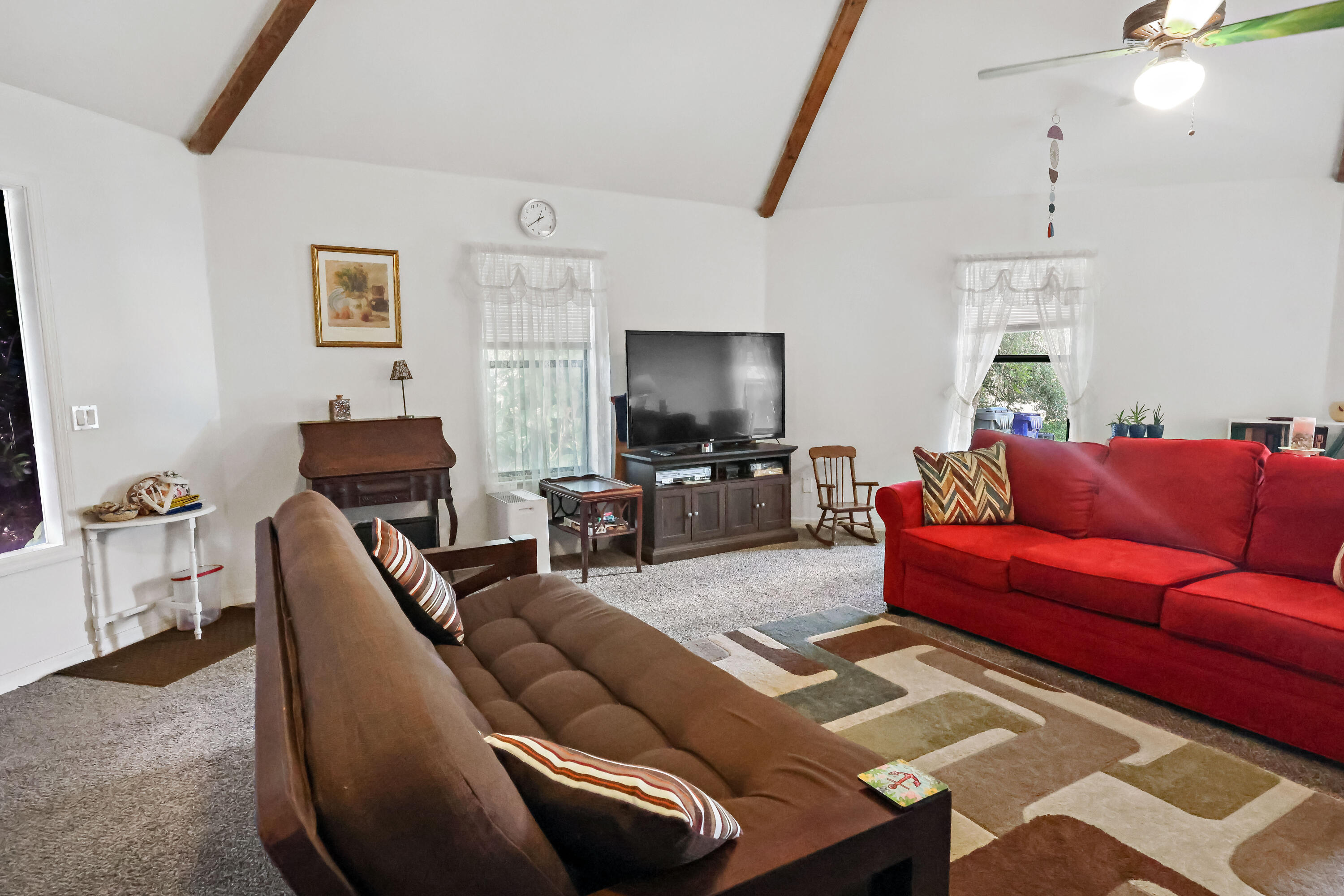 1466 24th Avenue Southwest Vero Beach, FL 32962 - Photo 6 of 29 a living room with furniture and a flat screen tv