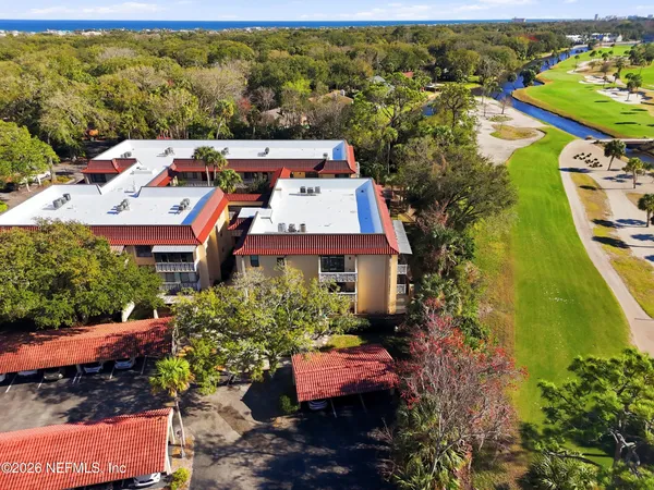 an aerial view of a house with a garden