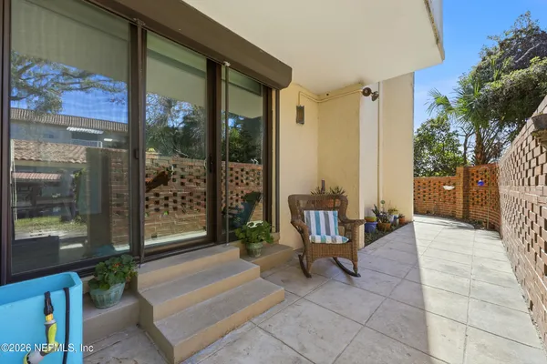 a building outdoor space with glass door and glass door