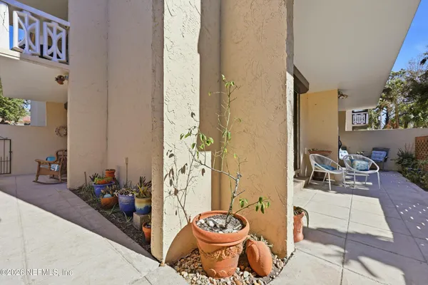 a living room with a couch and a table