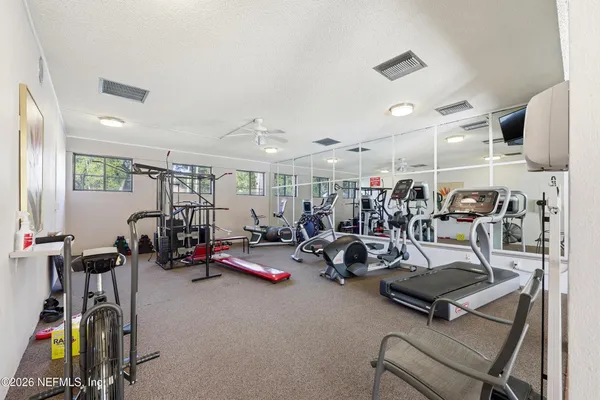a view of a room with gym equipment
