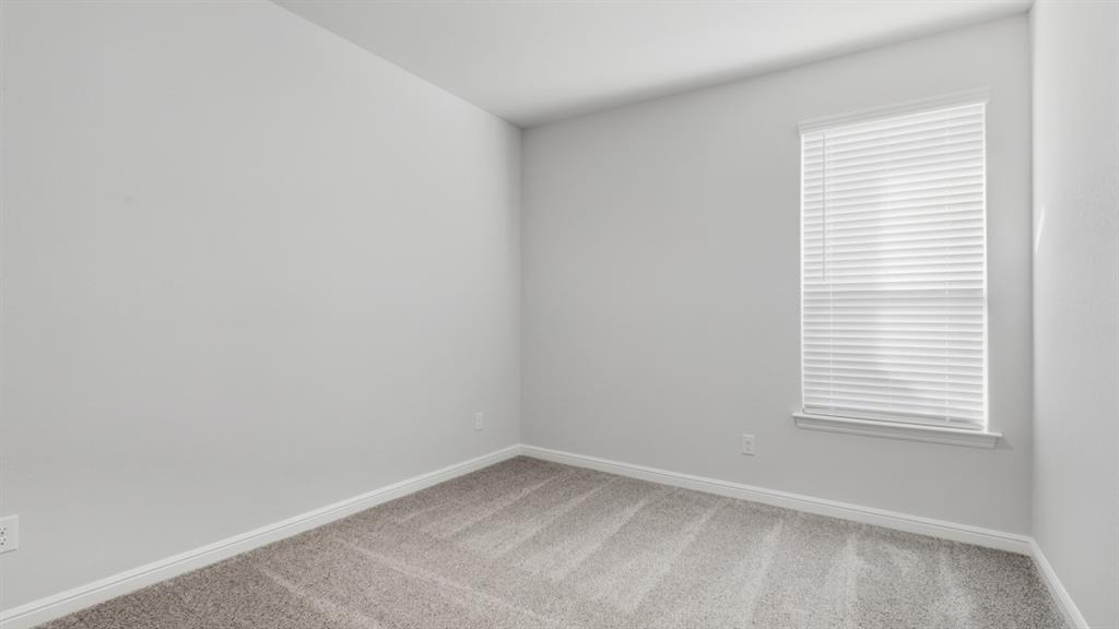 9621 Austin Holw Road Fort Worth, TX 76036 - Photo 17 of 23 an empty room with a window