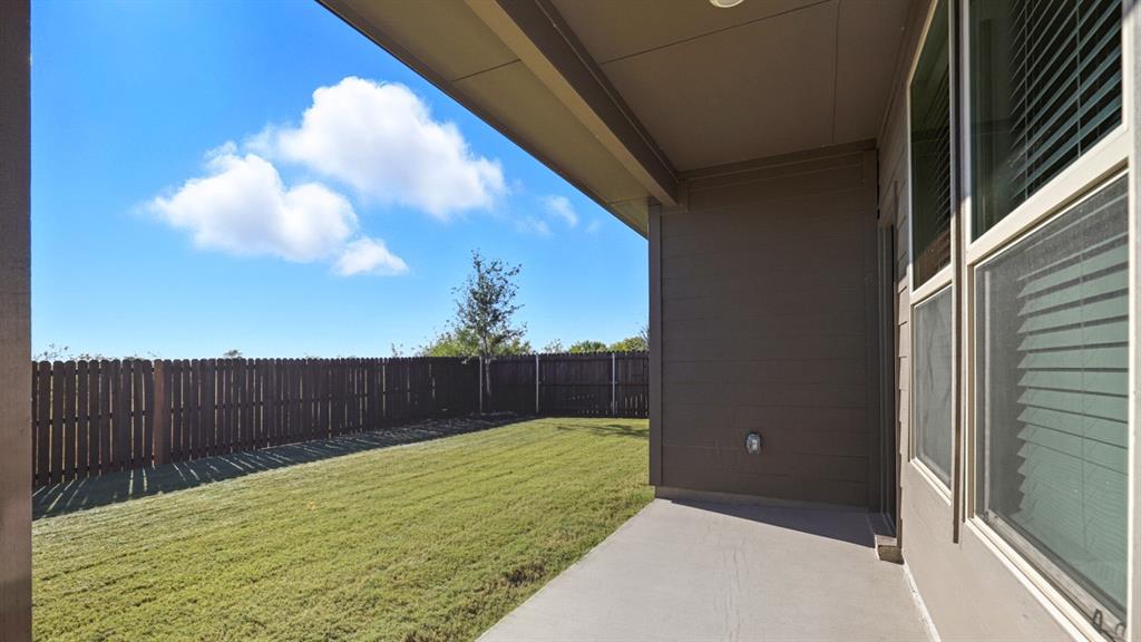 9621 Austin Holw Road Fort Worth, TX 76036 - Photo 19 of 23 a view of a backyard