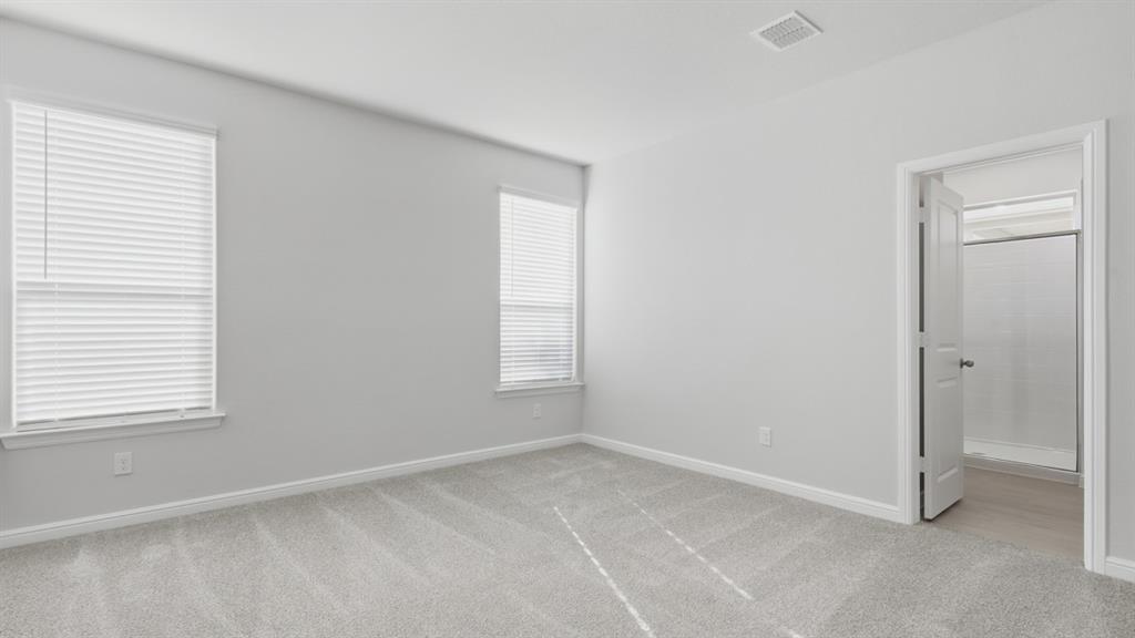 9621 Austin Holw Road Fort Worth, TX 76036 - Photo 8 of 23 an empty room with windows