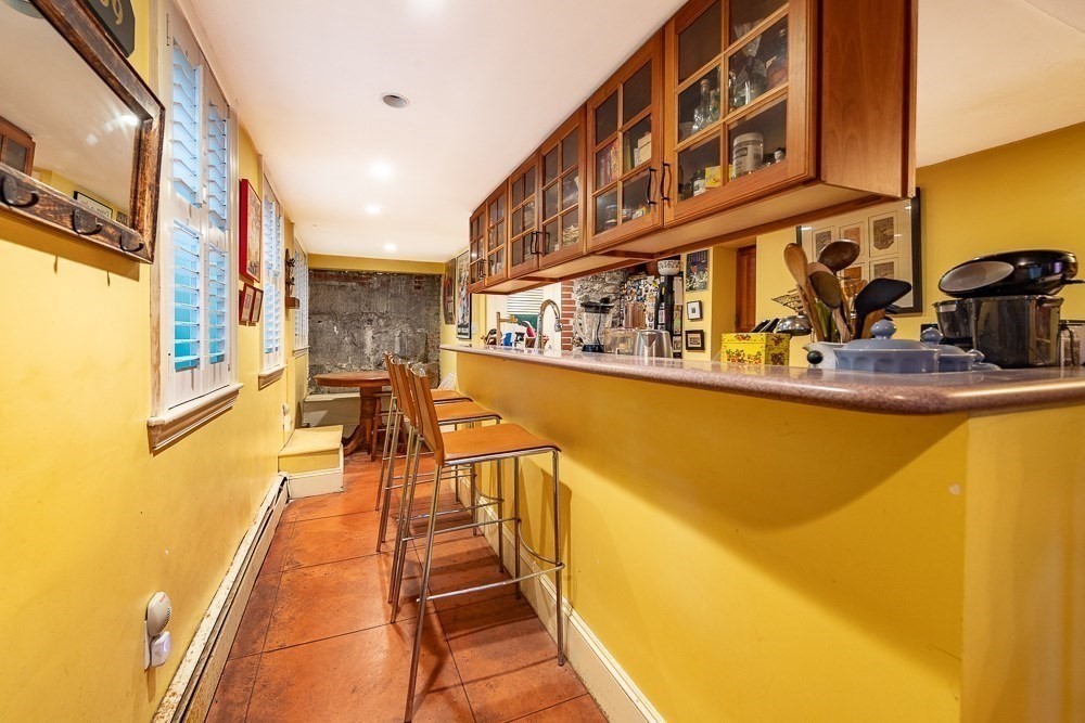 26 Cedar Street Boston, MA 02129 - Photo 11 of 19 a view of a swimming pool with a balcony