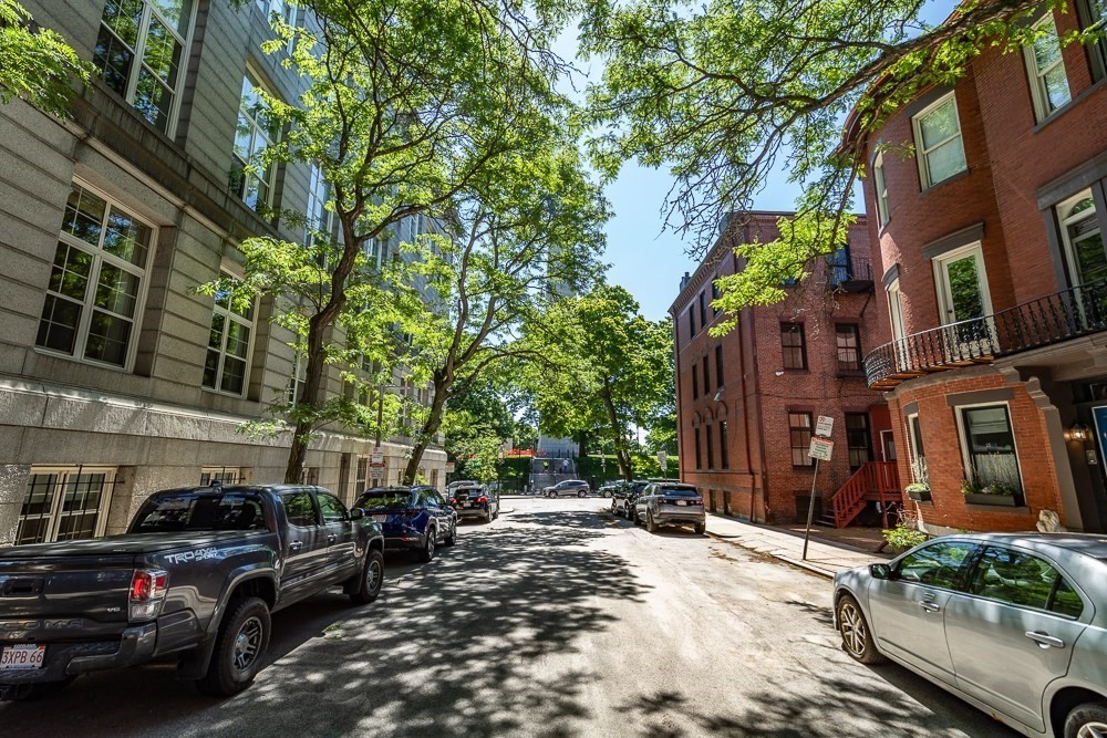 26 Cedar Street Boston, MA 02129 - Photo 18 of 19 a view of street with parked cars