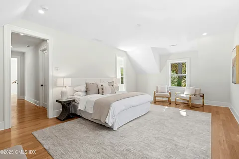 a bed room with a bed and a couch
