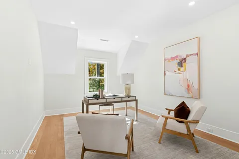 a workspace with furniture and window