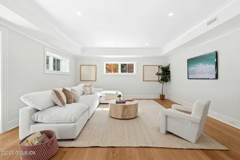 a living room with furniture and a couch