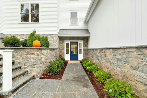 a front view of a house with an outdoor space