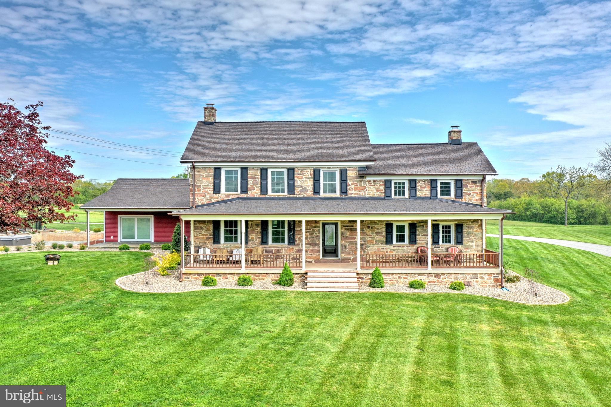 270 Cedar Ridge Road New Oxford, PA 17350 - Photo 1 of 129 a front view of a house with yard and green space