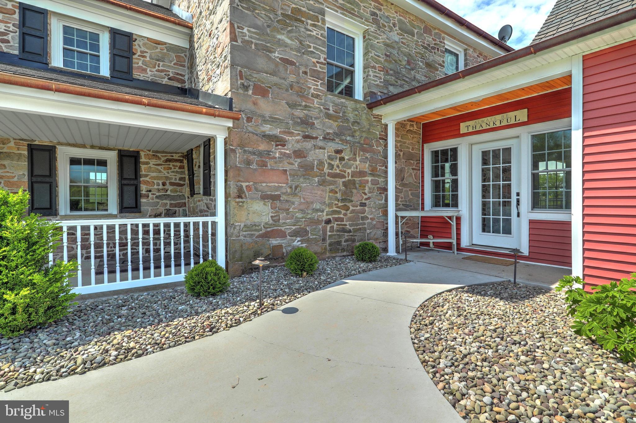 270 Cedar Ridge Road New Oxford, PA 17350 - Photo 22 of 129 a front view of a house with a porch