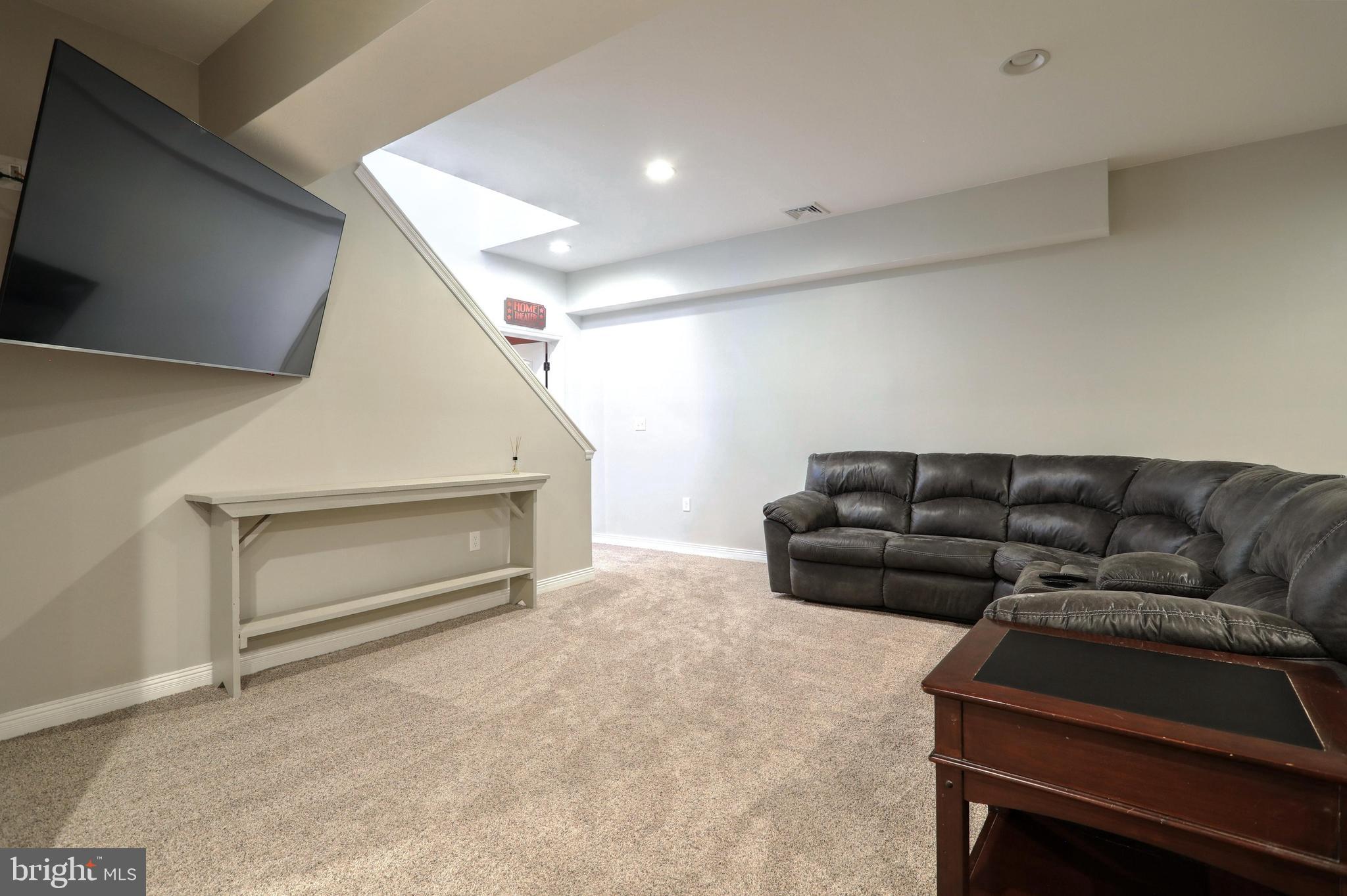 270 Cedar Ridge Road New Oxford, PA 17350 - Photo 57 of 129 a living room with a couch and a stove