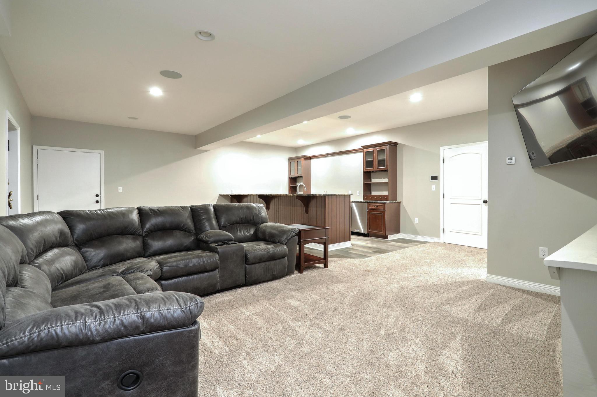 270 Cedar Ridge Road New Oxford, PA 17350 - Photo 58 of 129 a living room with furniture and a flat screen tv