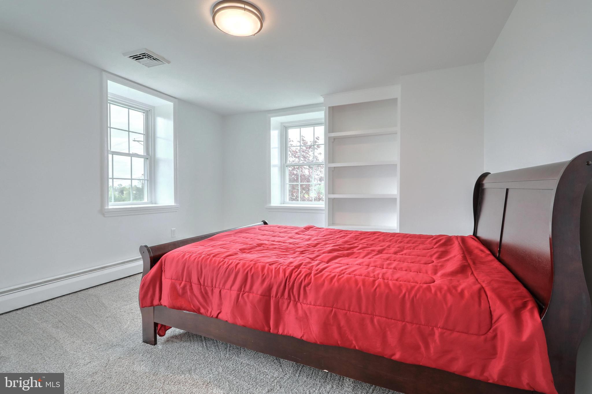 270 Cedar Ridge Road New Oxford, PA 17350 - Photo 67 of 129 a bed sitting in a bedroom next to a window
