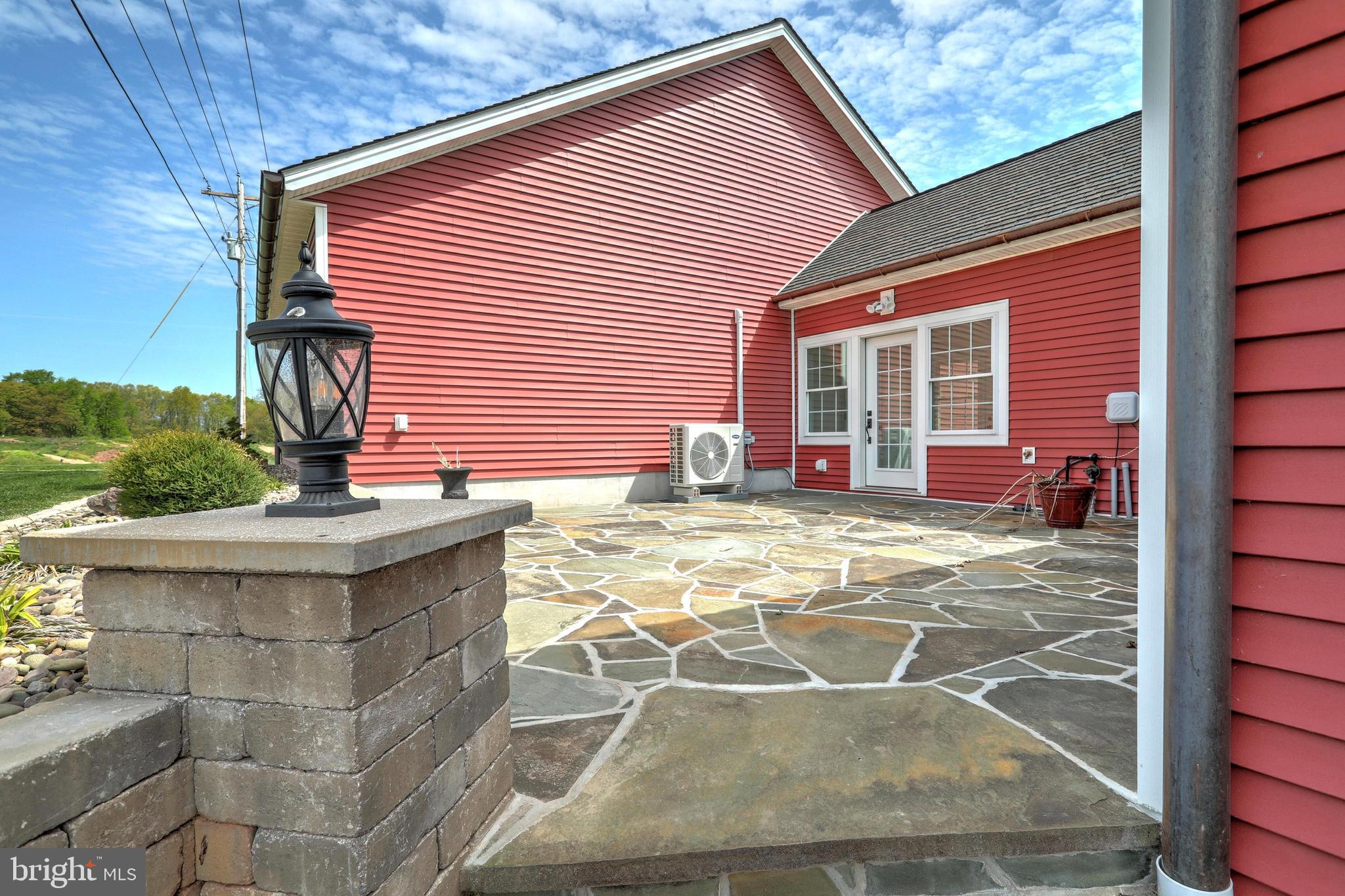 270 Cedar Ridge Road New Oxford, PA 17350 - Photo 10 of 129 a view of a lounge chairs in front of a door