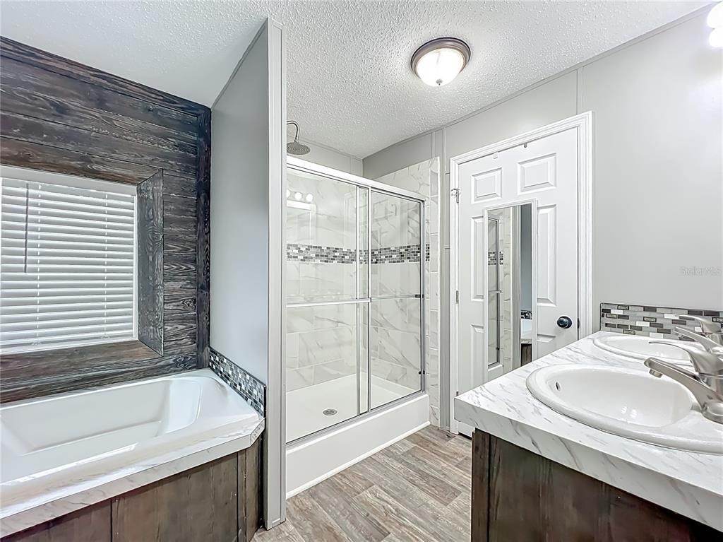 2815 Southwest 89th Place Ocala, FL 34476 - Photo 17 of 36 a bathroom with a sink and a mirror