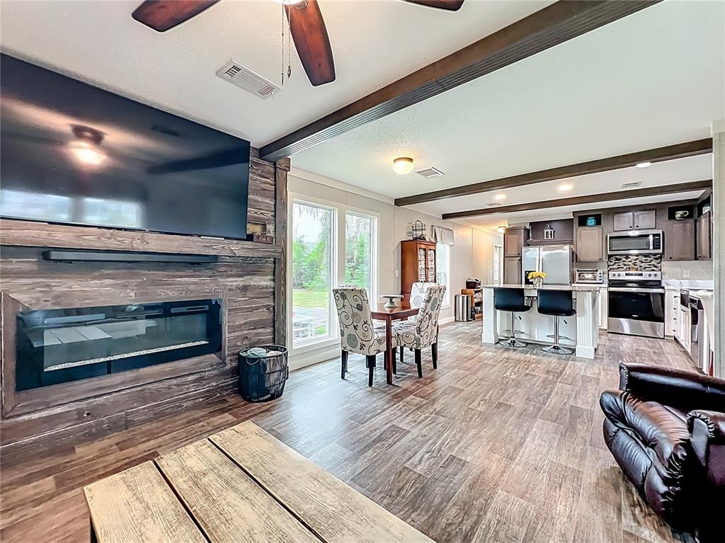 2815 Southwest 89th Place Ocala, FL 34476 - Photo 10 of 36 a view of a livingroom with furniture and a fireplace