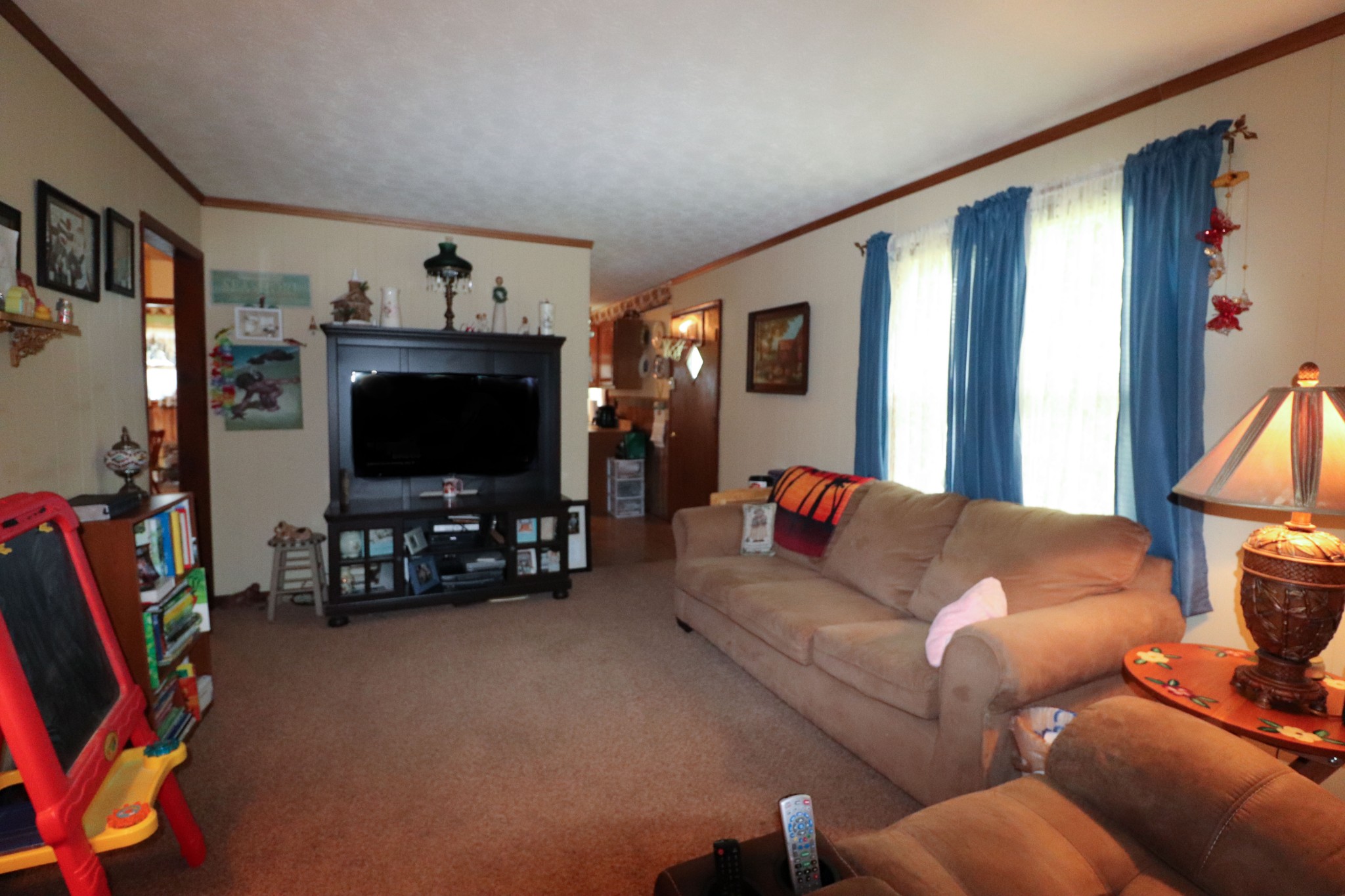 96 Cope Road Morrison, TN 37357 - Photo 12 of 19 a living room with furniture and a flat screen tv