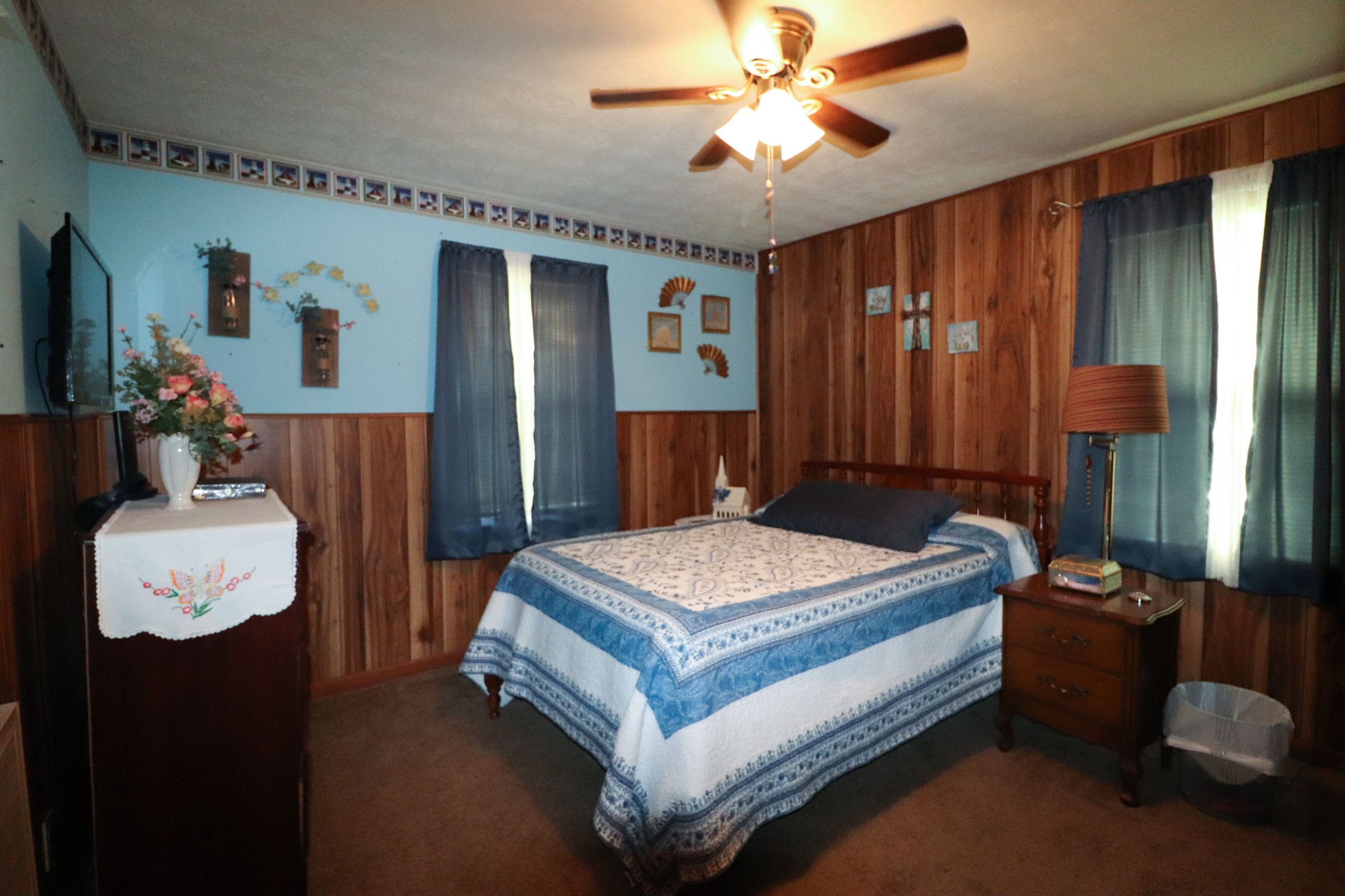 96 Cope Road Morrison, TN 37357 - Photo 17 of 19 a bedroom with a bed and a chandelier