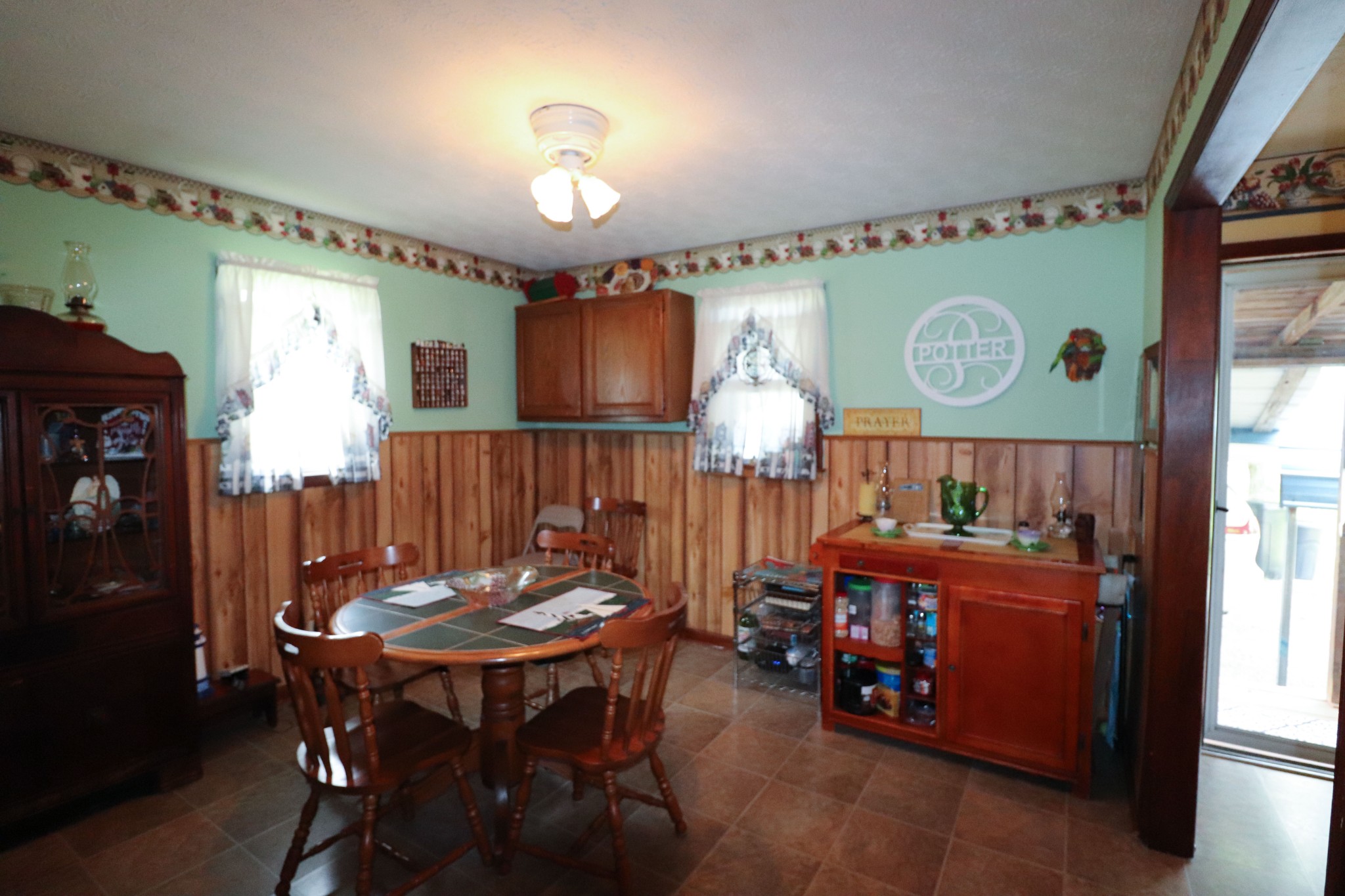 96 Cope Road Morrison, TN 37357 - Photo 8 of 19 a view of a dining room with furniture and chandelier