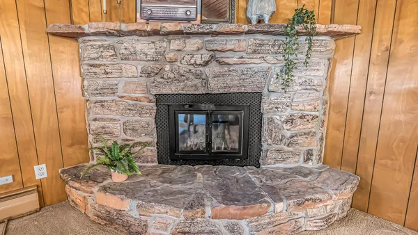 a living room with a fireplace