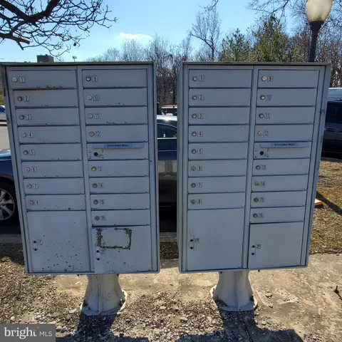 a view of a wooden door and a chair
